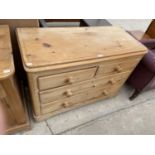 A VICTORIAN PINE CHEST OF TWO SHORT AND TWO LONG DRAWERS