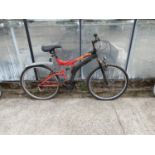 A GENTS POLARIS MOUNTAIN BIKE WITH FRONT AND REAR SUSPENSION AND 18 SPEED GEAR SYSTEM