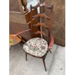AN ERCOL STYLE LADDER AND SPINDLE BACK ELBOW CHAIR WITH DETACHABLE CUSHION