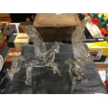 A CRYSTAL GLASS SCULPTURE OF A WINGED HORSE AND A BIRD OF PREY
