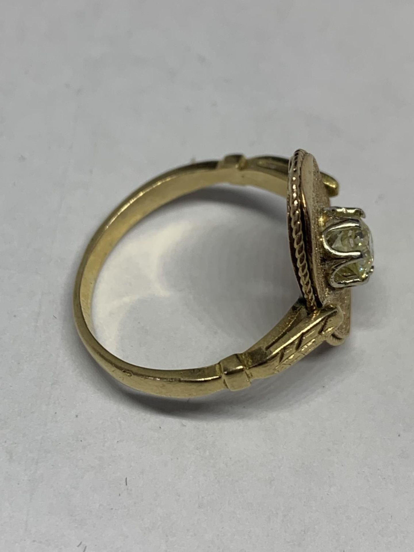 A 1920'S 18 CARAT GOLD OVAL RING WITH A SINGLE DIAMOND SIZE P/Q - Image 2 of 3