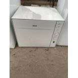A WHITE BOSCH COUNTER TOP DISHWASHER BELIEVED IN WORKING ORDER BUT NO WARRANTY