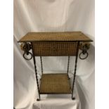 A SMALL METAL AND RATTAN WORK HALL TABLE WITH ELEPHANT HEAD DETAIL H:60CM