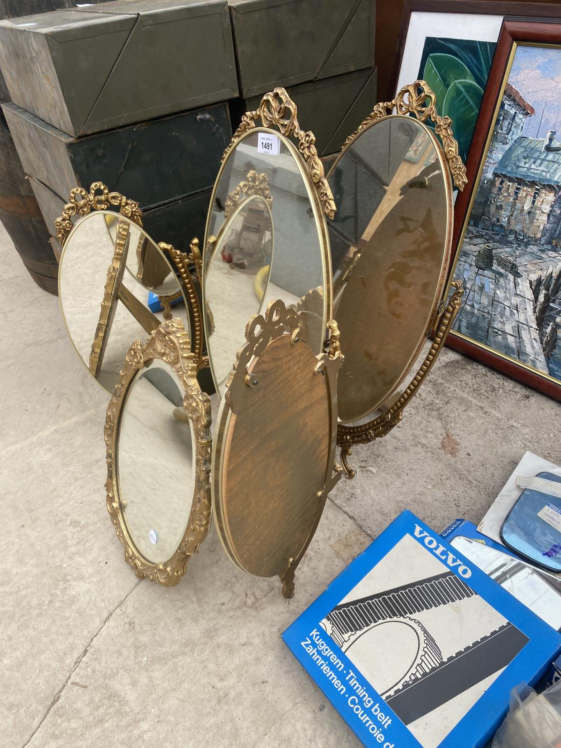 THREE DECORATIVE GILT FRAMED DRESSING TABLE MIRRORS