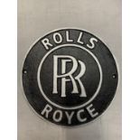 A CIRCULAR CAST METAL ROLLS ROYCE SIGN 24CM