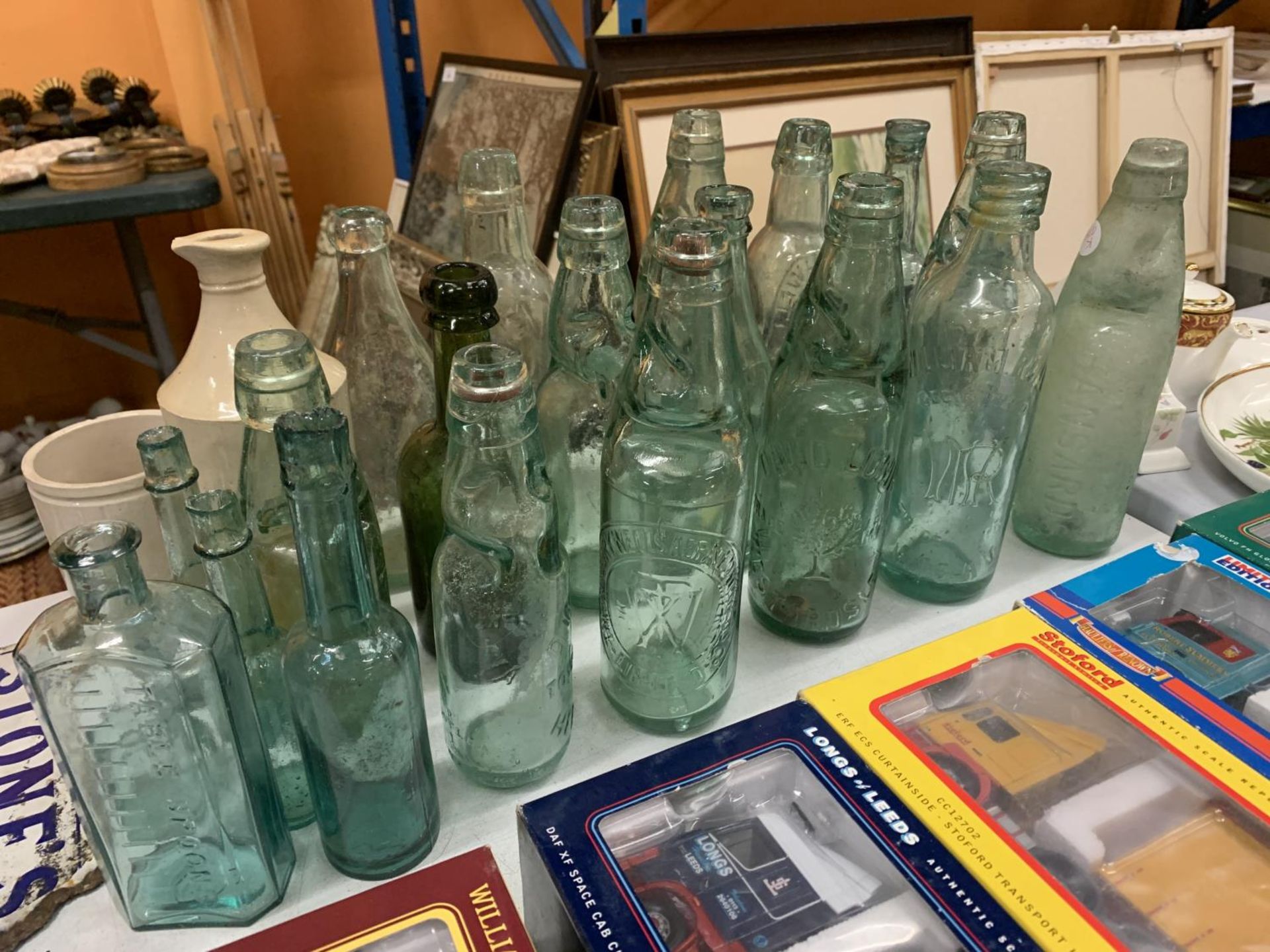 A COLLECTION OF VINTAGE GLASS BOTTLES, STONEWARE JARS AND A SMALL ENAMEL 'STONE'S ORANGE WINE' - Image 2 of 4