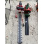 A PAIR OF ELECTRIC HEDGE TRIMMERS TO INCLUDE A QUALCAST
