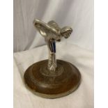 A WHITE METAL FLYING LADY MASCOT MOUNTED ON AN OAK PLINTH H: APPROX 13.5CM