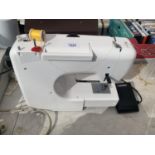 A LERVIA SEWING MACHINE WITH FOOT PEDDLE