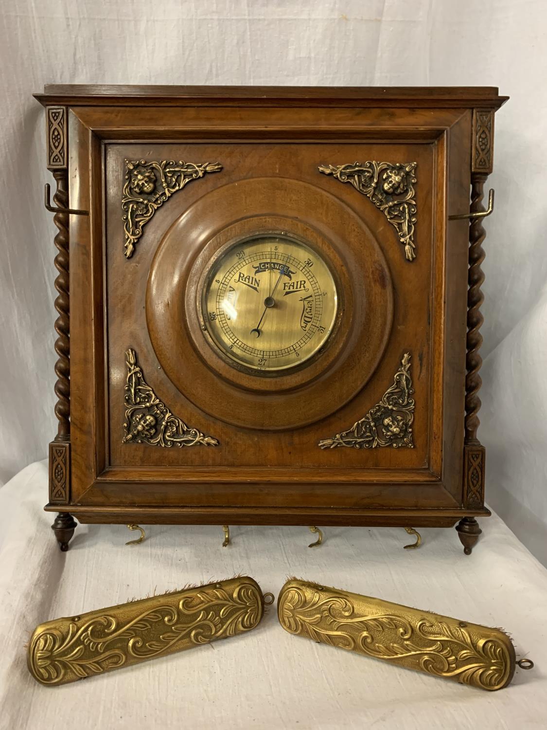 A VINTAGE WALNUT WALL BAROMETER COMPLETE WITH CLOTHES BRUSHES