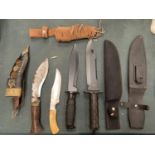 FOUR HUNTING KNIVES WITH CASES