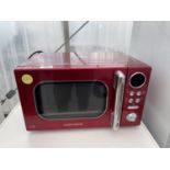 A RED MORPHY RICHARDS MICROWAVE