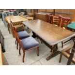 AN ERCOL STYLE ELM REFECTORY TABLE AND FOUR MAHOGANY DINING CHAIRS