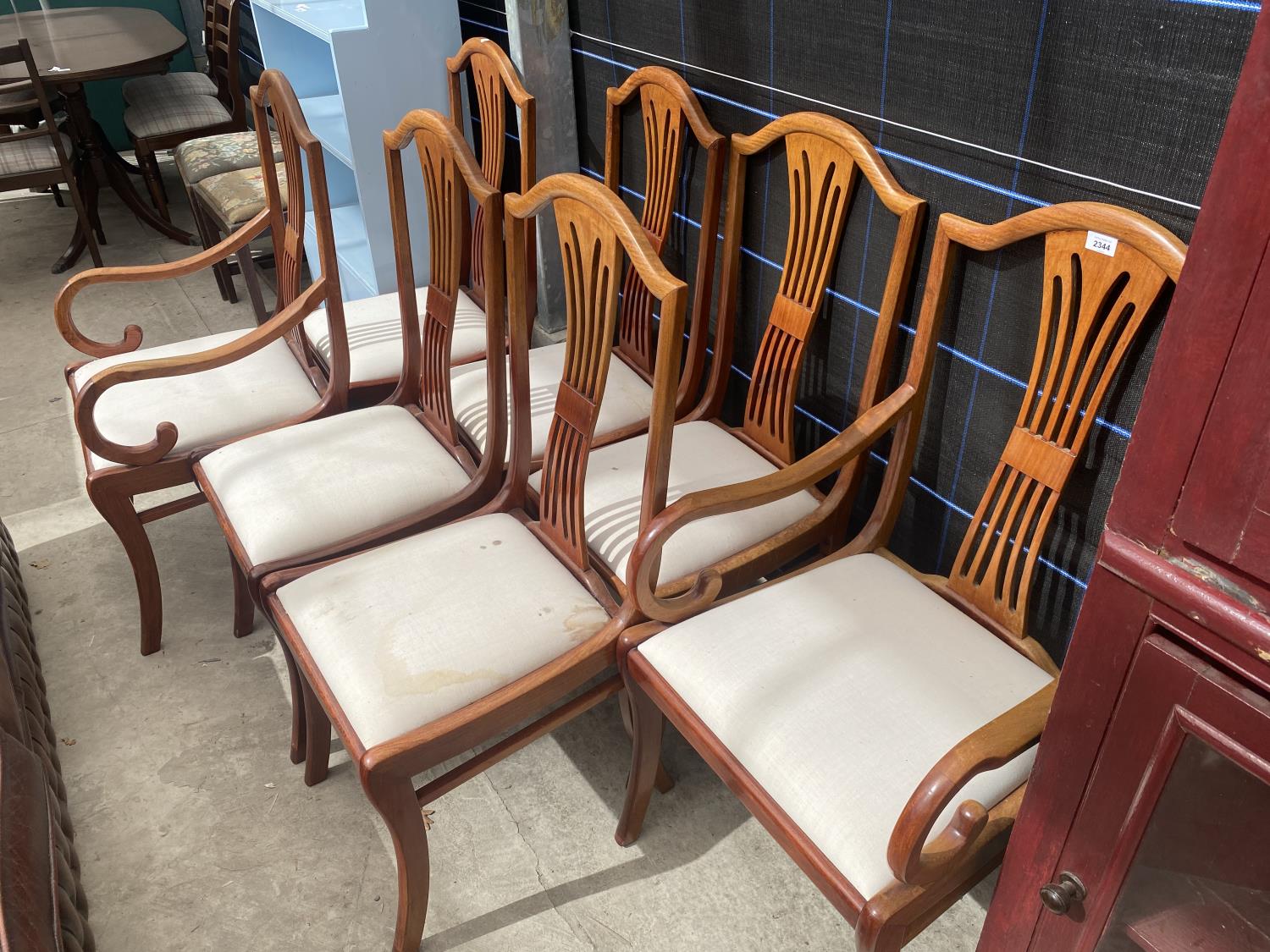 A SET OF 6 PIERCED SPLIT BACK DINING CHAIRS