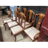 A SET OF 6 PIERCED SPLIT BACK DINING CHAIRS