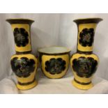 A GROUP OF DECORATIVE CARLTON WARE, A PLANTER AND A PAIR OF VASES H: 32.5CM