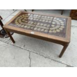 A RETRO TILED TOP TEAK COFFEE TABLE