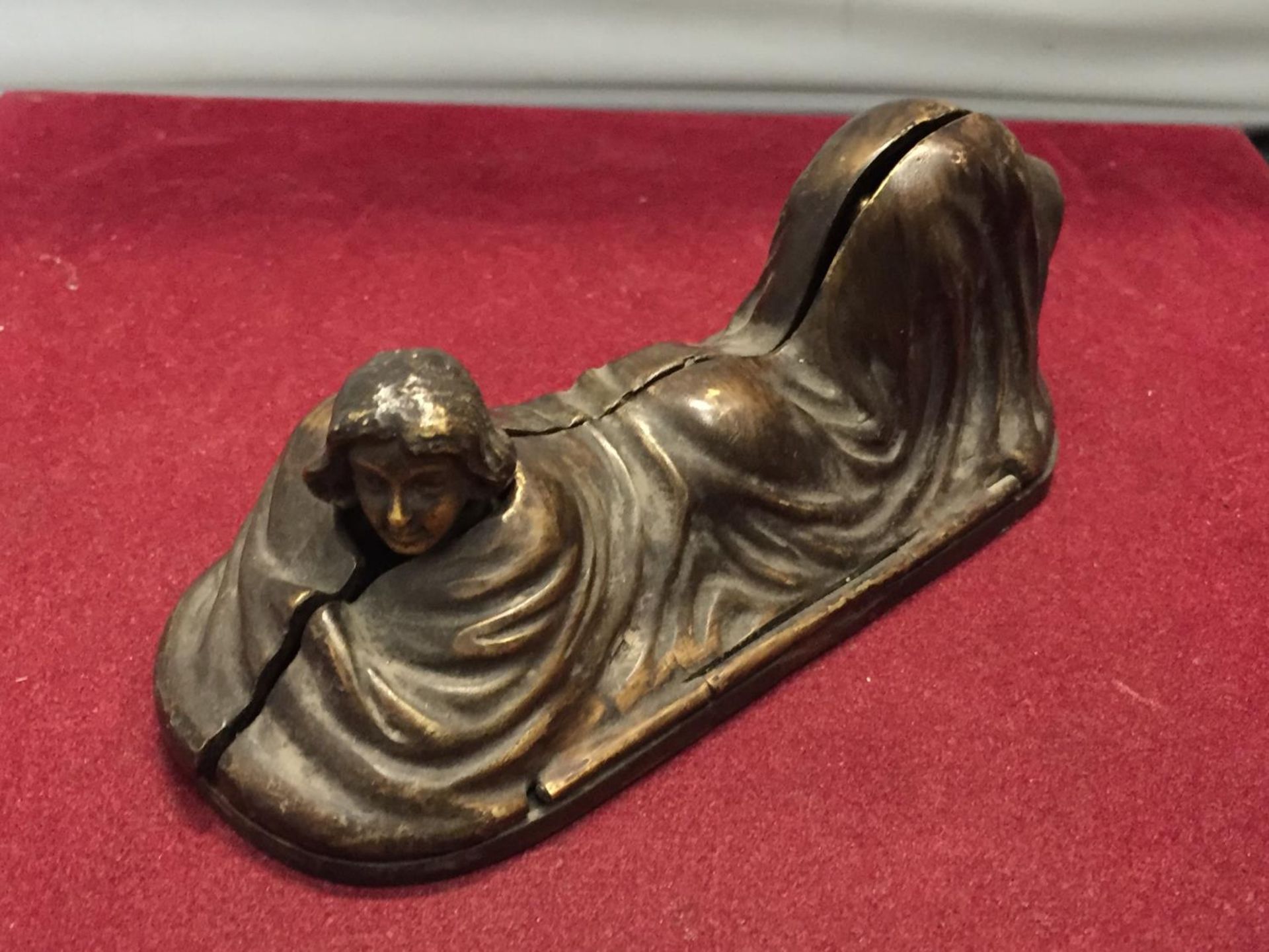 A BERGMAN STYLE COLD PAINTED BRONZE OF A LADY IN A BLANKET LENGTH APPROXIMATELY 14CM