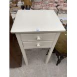 A MODERN TWO DRAWER BEDSIDE CHEST