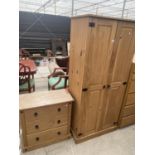 A 2 DOOR MEXICAN PINE WARDROBE AND MATCHING CHEST OF 3 DRAWERS