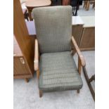 A PARKER KNOLL STYLE FIRESIDE CHAIR