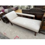 AN EDWARDIAN MAHOGANY FRAMED CHAISE LONGUE