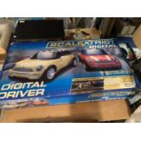 A SCALEXTRIC DIGITAL DRIVER MINI COOPER IN ORIGINAL BOX