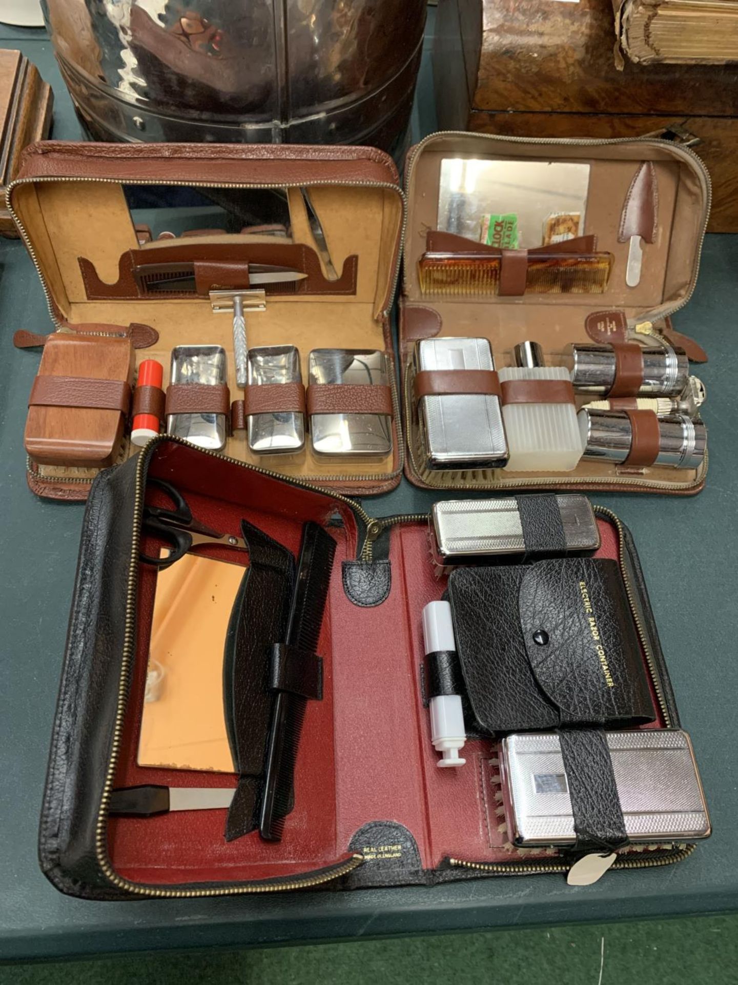 THREE VINTAGE CASED GENTLEMAN'S GROOMING KITS