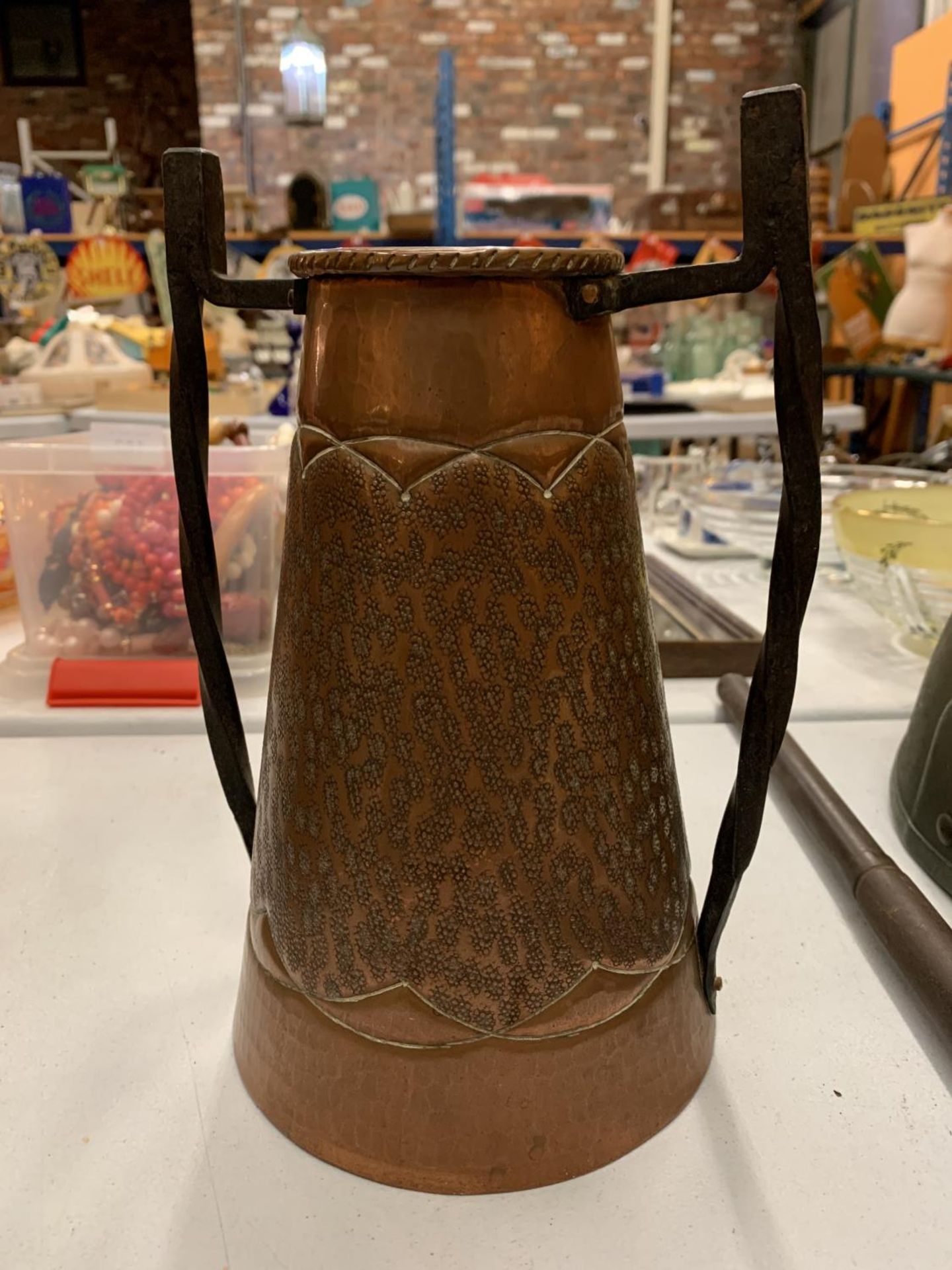 AN ARTS & CRAFTS COPPER AND IRON HANDLED VASE WITH EMBOSSED DRAGON AND CROWN DECORATION - Image 2 of 3