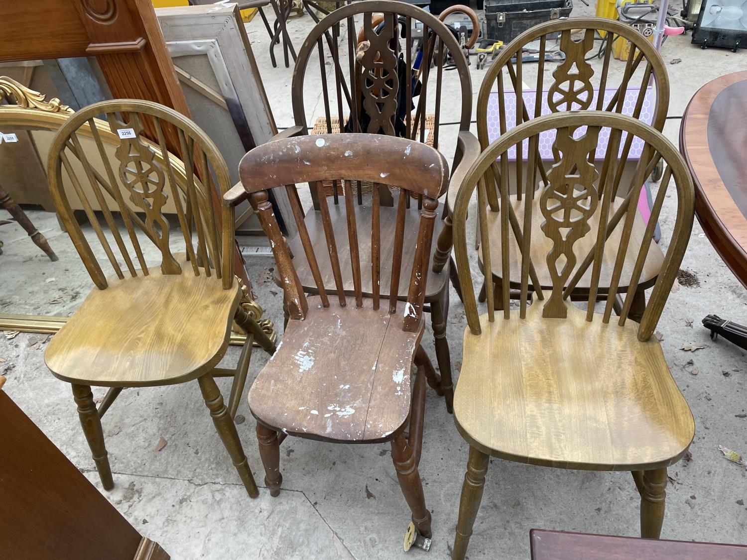 FOUR WINDSOR STYLE WHEELBACK CHAIRS (ONE CARVER) AND SINGLE KITCHEN CHAIR