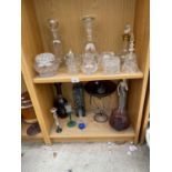 A COLLECTION OF GLASS WARE TO INCLUDE DECANTORS, EPNS TOPPED SUGAR SHAKER AND COLOURED VASES ETC