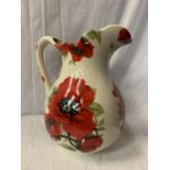 A VERY LARGE JUG BY HERON CROSS POTTERY WITH POPPY DETAIL H: 29CM