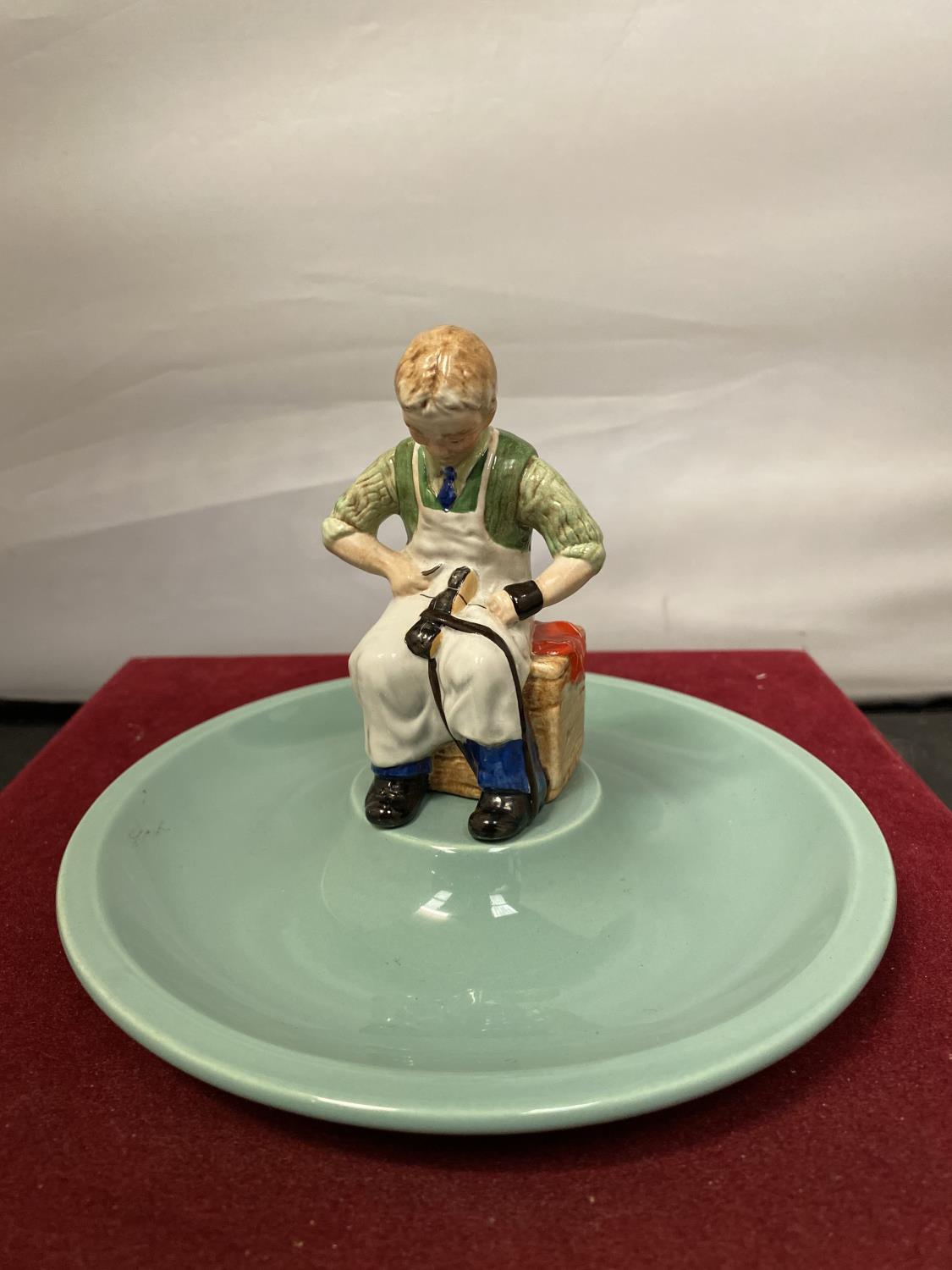 A BESWICK COBBLER SHOEMAKER DISH TIMPSON SHOES