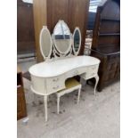 A WHITE AND GILT KIDNEY SHAPED DRESSING TABLE COMPLETE WITH STOOL