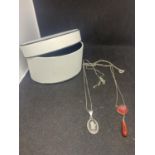 TWO SILVER NECKLACES WITH PENDANTS TO INCLUDE A BLACK JASPERWARE AND A RED STONE WITH DROP