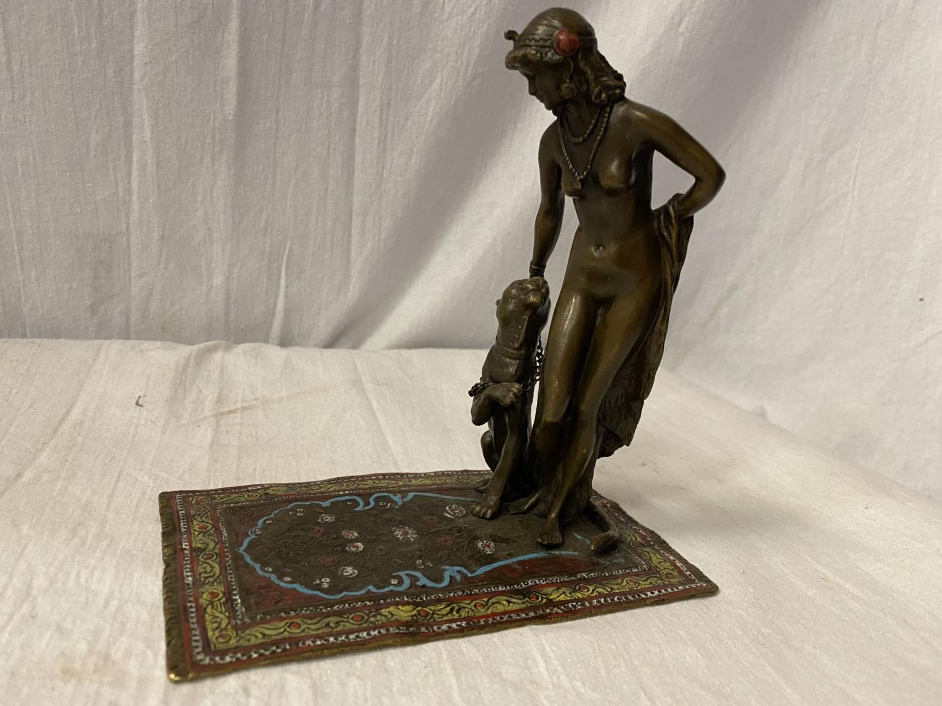 A BERGMAN STYLE COLD PAINTED NAN GREB BRONZE IN THE FORM OF A DANCER AND LIONESS H: APPROXIMATELY