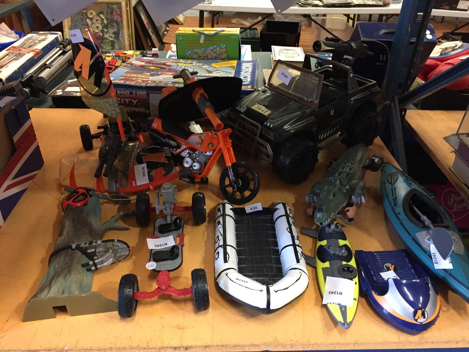 A VARIETY OF ACTION MAN VEHICLES AND BOATS