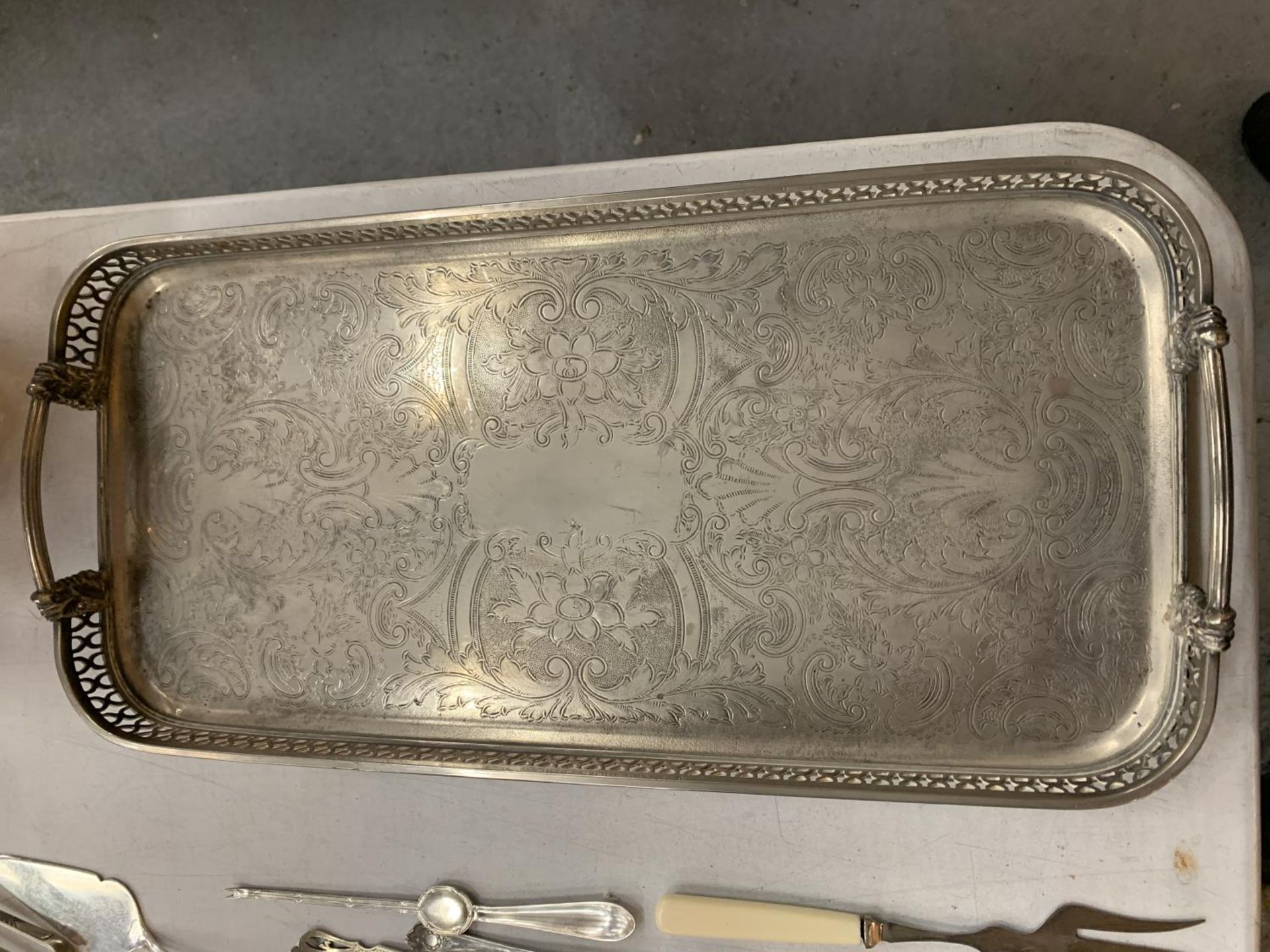 A SILVER PLATED RECTANGULAR SERVING TRAY, A PEWTER OIL LAMP WITH EMBOSSED LEAF DECORATION BY JEAN - Image 4 of 4