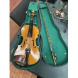 A VIOLIN WITH CASE