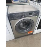 A GRAPHITE HOTPOINT 7KG A++ WASHING MACHINE, PAT TEST, FUNCTION TEST AND SANITIZED BUT NO WARRANTY