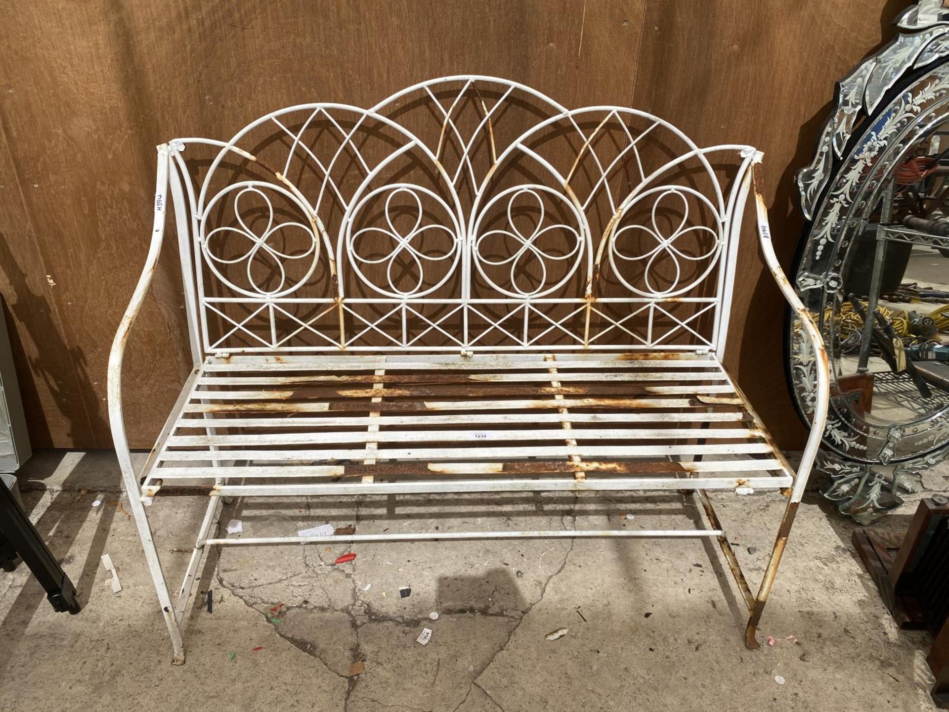 A WHITE PAINTED ALUMINIUM GARDEN BENCH