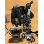FIVE PAIRS OF BINOCCULARS ONE BEING A VINTAGE LEATHERED EXAMPLE, A VINTAGE NETTAR CAMERA, A