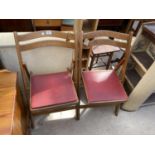 A PAIR OF MID 20th CENTURY FOLDING CHAIRS
