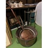 A VERY LARGE BRASS PRESERVING PAN, A BED WARMER, A LARGE COPPER DEEP SIDED VINTAGE FRYING PAN AND
