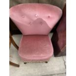 A BUTTON BACK UPHOLSTERED NURSING CHAIR