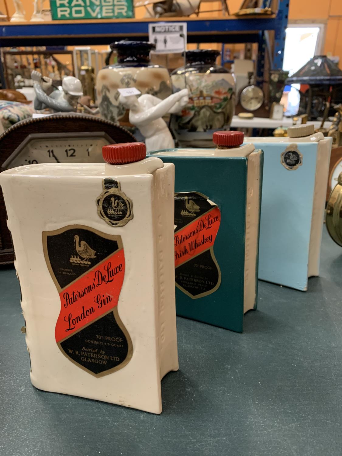 THREE VINTAGE STONEWARE WHISKEY DECANTERS IN THE FORM OF BOOKS ORIGINALLY BOTTLED BY W.R. PATERSON - Image 2 of 3