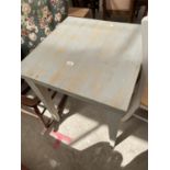 A MODERN PAINTED KITCHEN TABLE 25.5" SQUARE