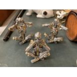 A STEAMPUNK STYLE SPEAK, SEE AND HEAR NO EVIL SKELETON TRIO