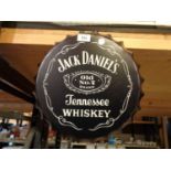 A TIN METAL BOTTLE TOP SIGN 'JACK DANIELS'