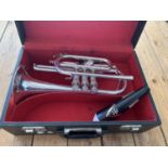 A SILVER PLATED CORNET IN A CASE